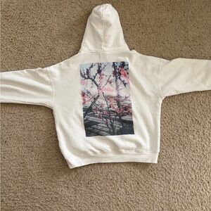 Essentials White Hoodie with Pink and Black Graphic